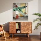 Original art print of the painting titled airplane blow IV. A little girl with a red dress blows on a large green plane flying through the air